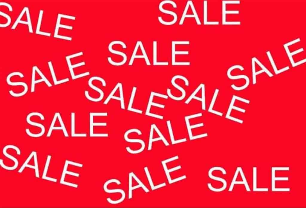 red sale sign with multiple sales