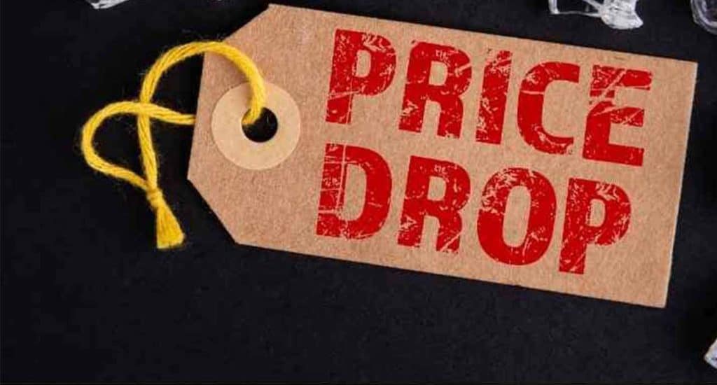 brownn price drop sign with red writing