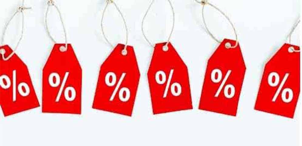 red sale tags with percentage signs on them