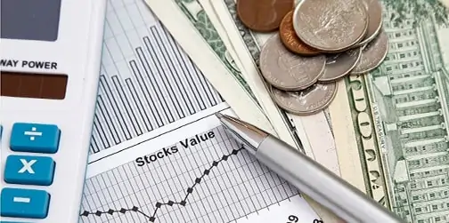 Home 13 graph, calculator, stock chart, american USD dollars and change with a pen