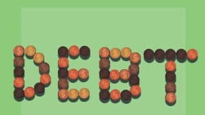 Green background with debt written in brown pennies