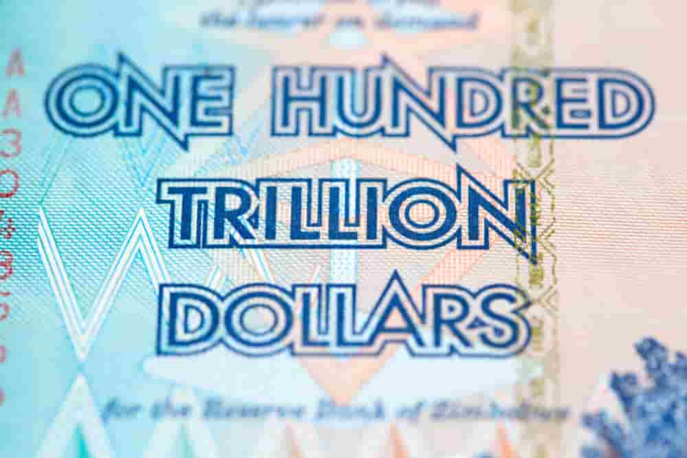 How to Survive Hyperinflation 1 zimbabwe money that says one hundred trillion dollars