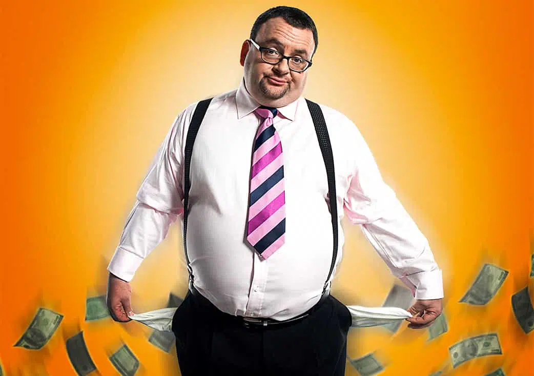 Home 17 chubby man in dress clothes with pockets out indicating no money