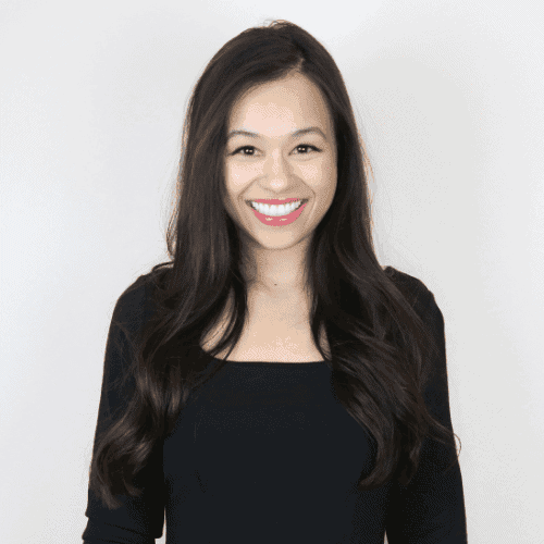 headshot of erika kullberg wearing black shirt with a smile lawyer turned youtube star for personal finance.