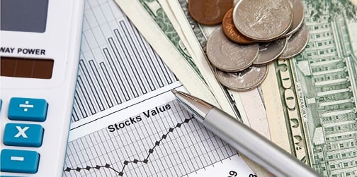 graph, calculator, stock chart, american USD dollars and change with a pen