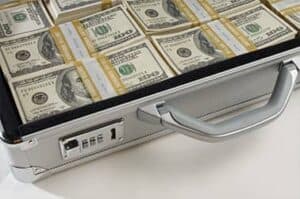 USD american dollars in a grey briefcase on loans for teens